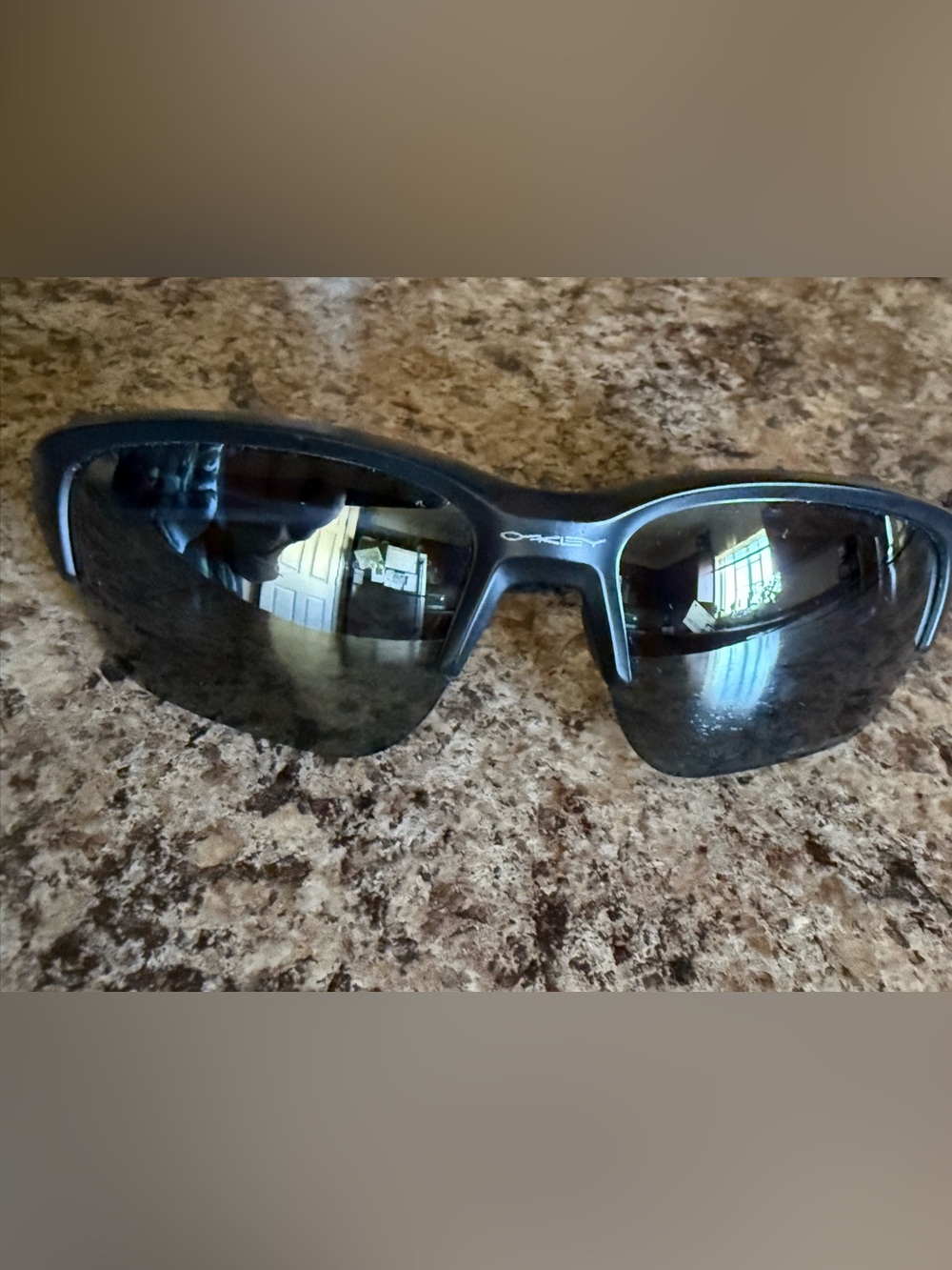 Oakley Black Wraparound Sunglasses with Dark Lenses